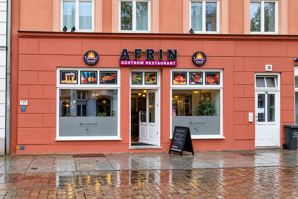 AFRIN – Fassadenbeschriftung und bedruckte Fensterflächen.